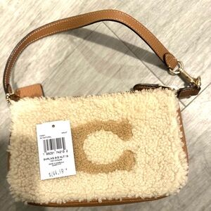 Coach Sherpa purse. Can be held like a regular purse or wrist purse